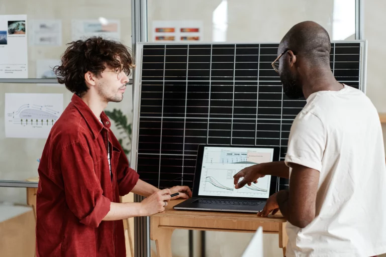 A Solar Power Tucson team member explains how a solar system works to a customer.